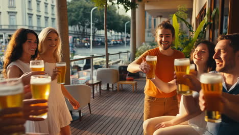 friends toasting beer at an outdoor cafe