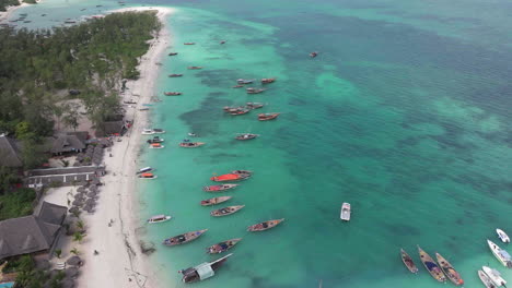 Drone-shot-with-boat-green-trees-and-transparent-green-water