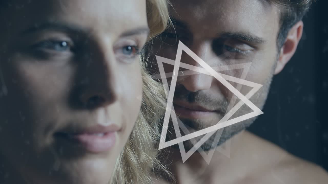 Animation of moving shapes over caucasian couple