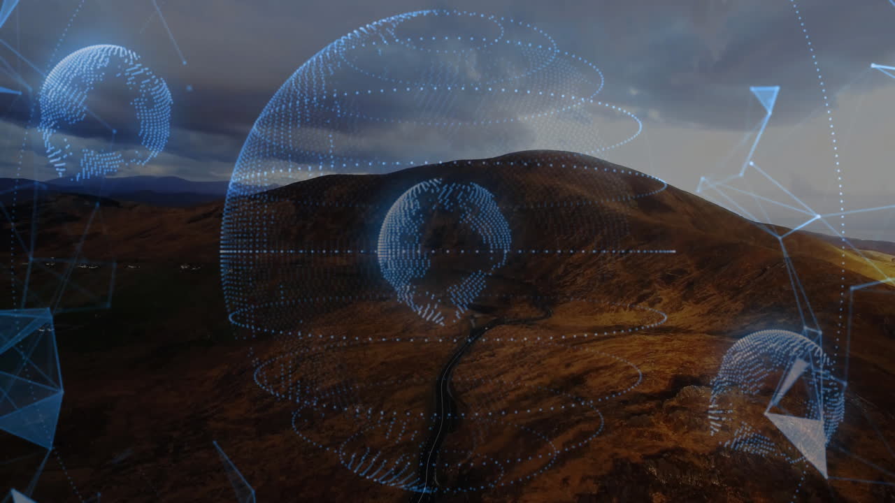 Animating digital globe and network connections over mountainous landscape