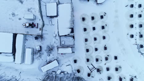 topdown view of snow-covered neighborhood in european country during winter