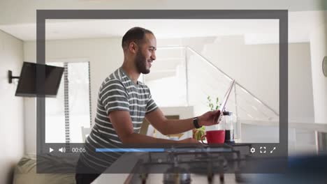 animación del procesamiento de datos sobre un hombre biracial usando una tableta