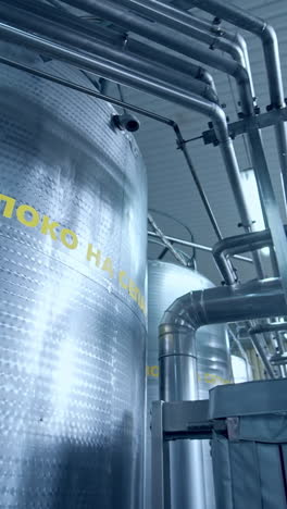 industrial dairy production factory. metallic stainless steel pipes in modern dairy plant