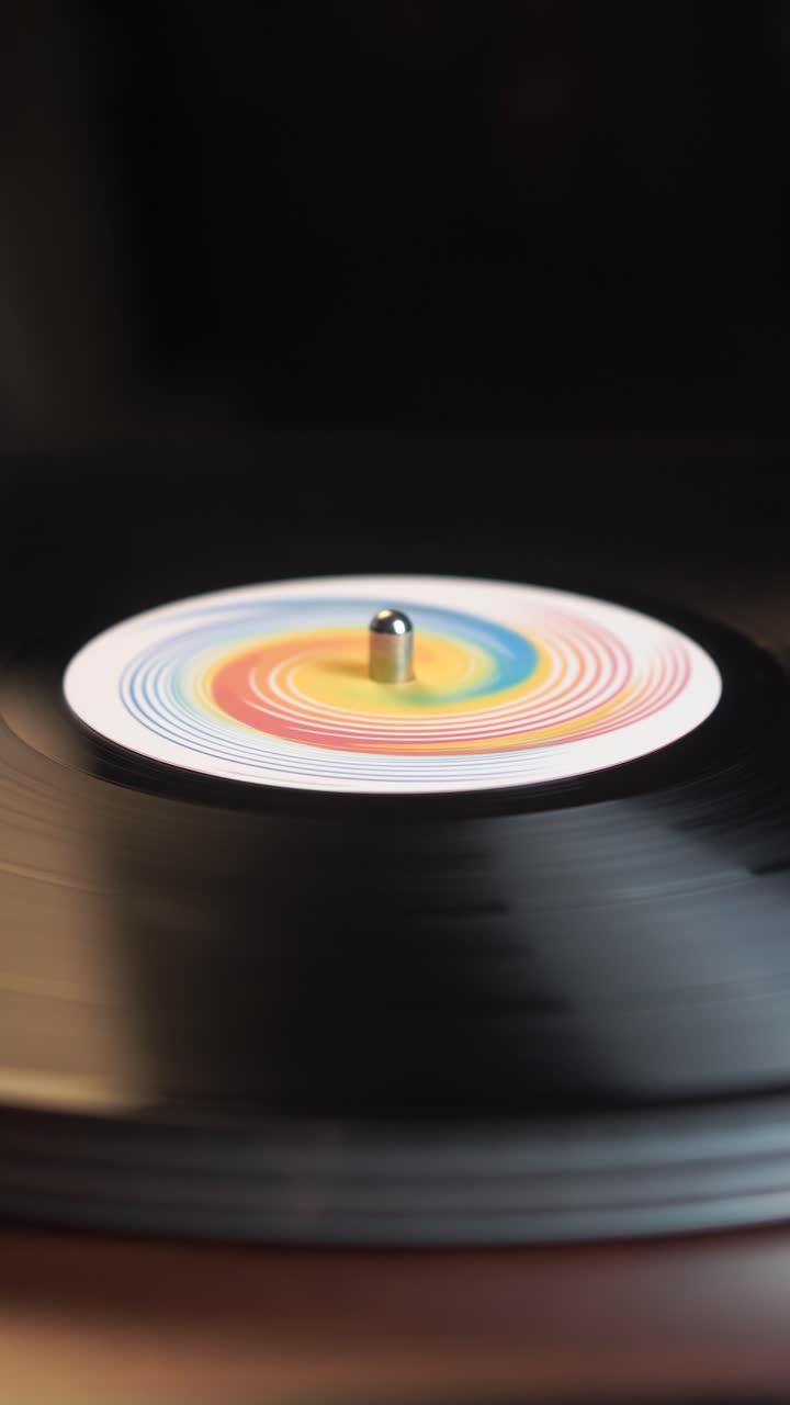 Vinyl Record Spinning on a Turntable with Colorful Label