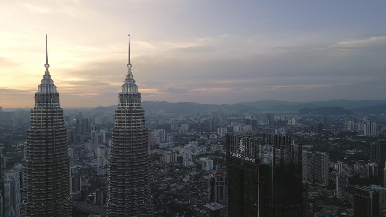 Aerial Sunset Panoramic view of Kuala Lumpur Malaysian City Center, KLCC, Petronas Twin Towers