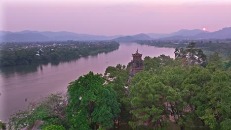 the shot highlights the tranquil surroundings, lush greenery, and distant mountains, offering a glimpse into the peaceful and picturesque landscape of this historic city