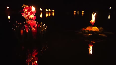 decorated lantern float in river at loy krathong festival in thailand