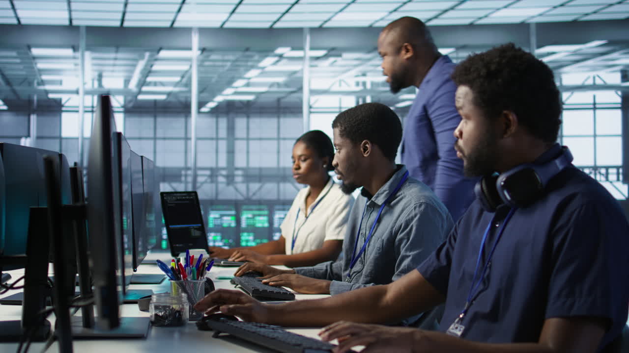 Diverse IT Team Working in a Server Room