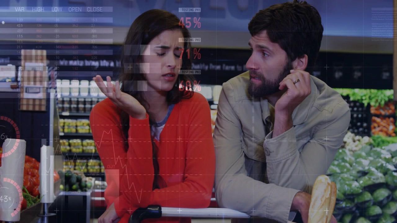 Woman gesturing starting charts and red dots overlaying as man listening in grocery, weighing costs