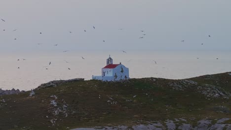 Abandoned-island-church-with-seagulls-in-slow-motion