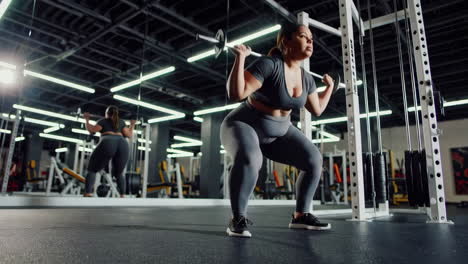 plus-size woman weightlifting in gym
