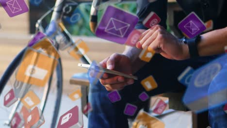 colourful cubes rising while man is using smartphone in the background