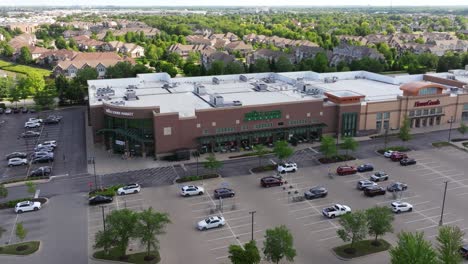 aerial view of a suburban shopping center with whole foods market and homegoods
