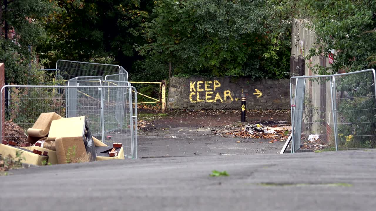 urban keep clear sign, derelict industrial cut away
