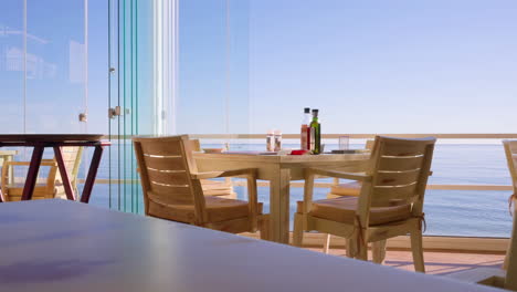 several clips of an empty table at a beach restaurant