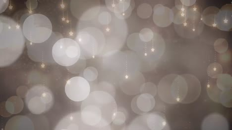 Animation-of-glowing-christmas-stars-falling-over-blinking-defocussed-white-light-spots