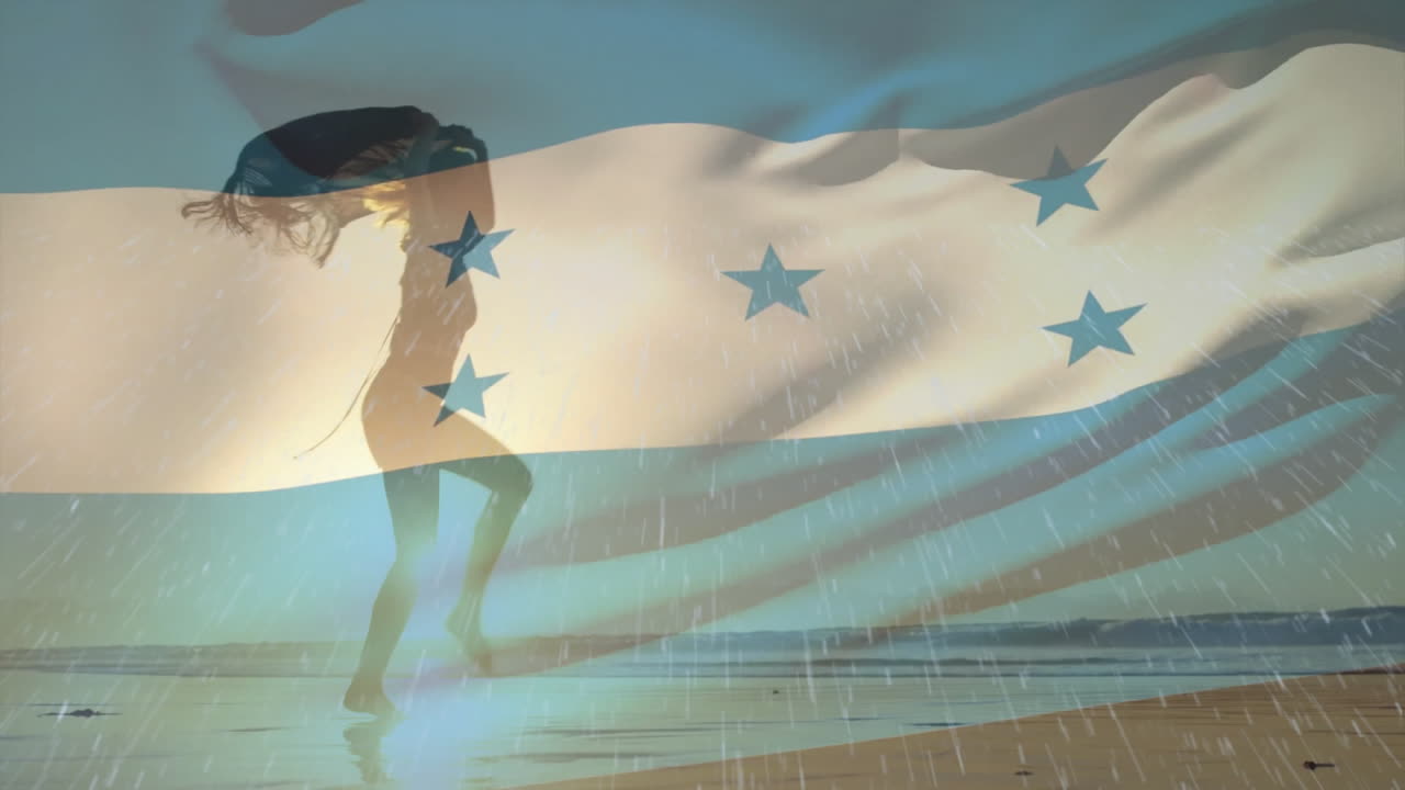Running on beach, silhouette of person with Honduras flag animation overlay