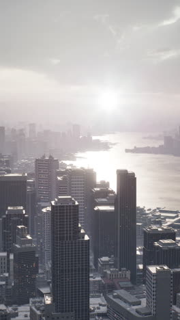 aerial view of a modern city skyline at sunset