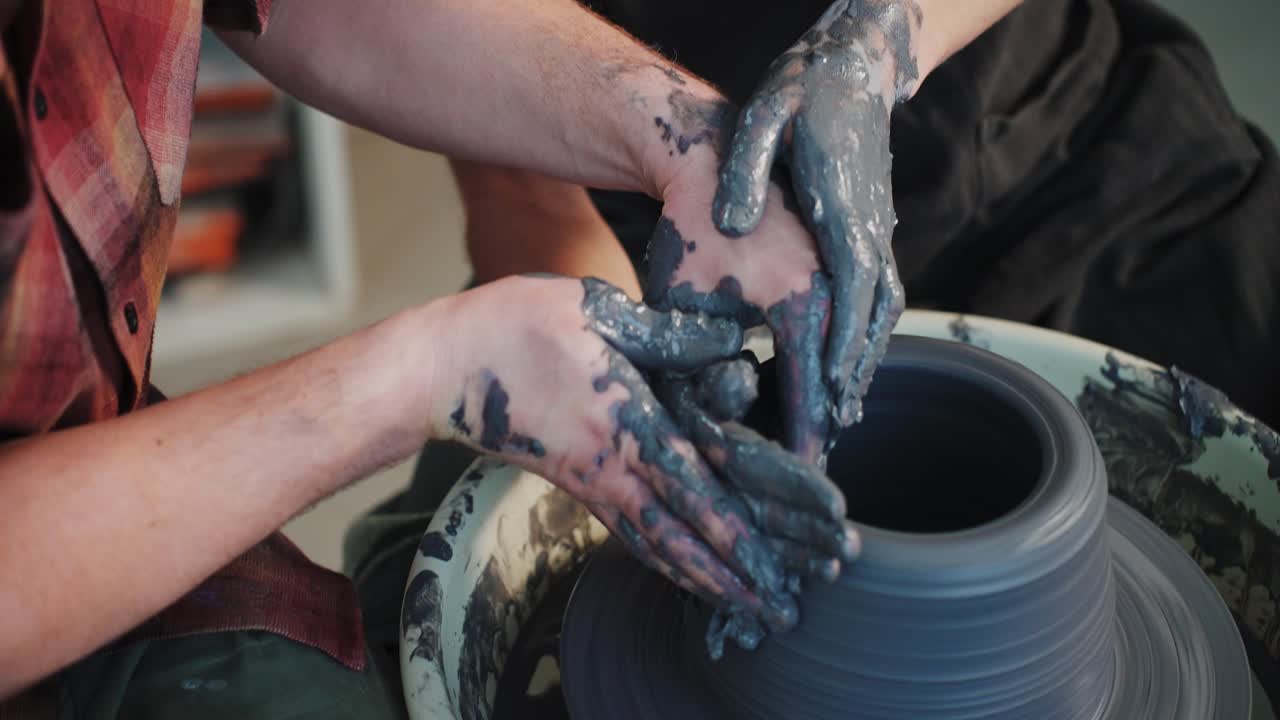 Pottery Class: Hands Shaping Clay on a Wheel