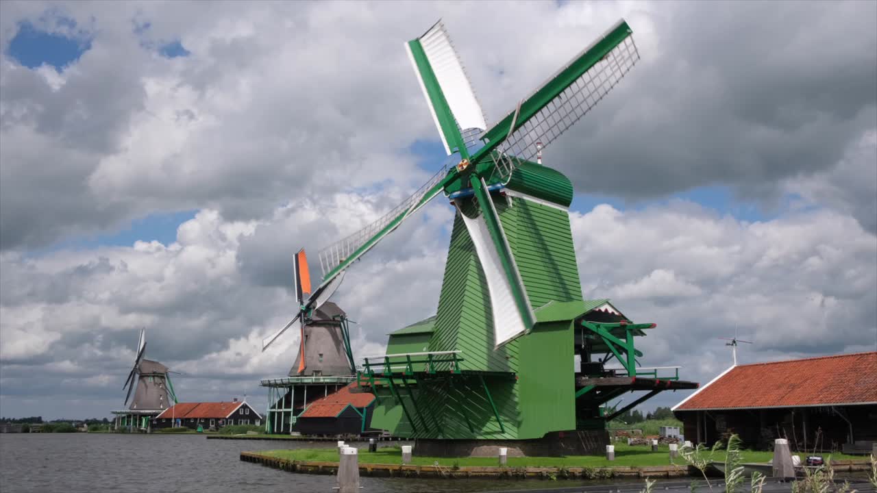 Sentinels of craft and toil, wooden windmill frames steeped in history