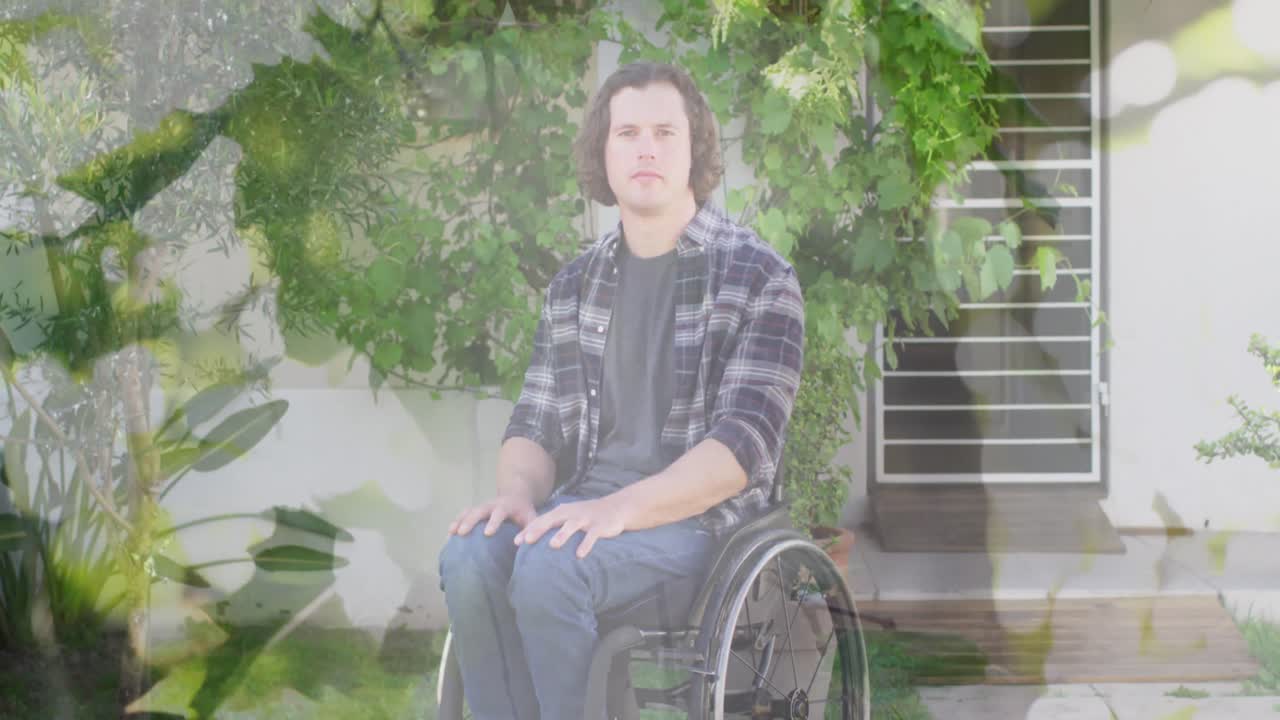 체어에 앉아 있는 장애인 백인 남성 위의 잎의 애니메이션