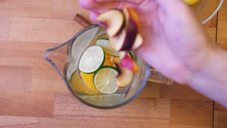 the cook throws the nectarine into the jug