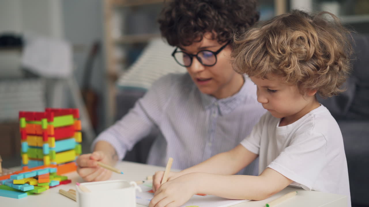 Mother and child engaging in educational activities