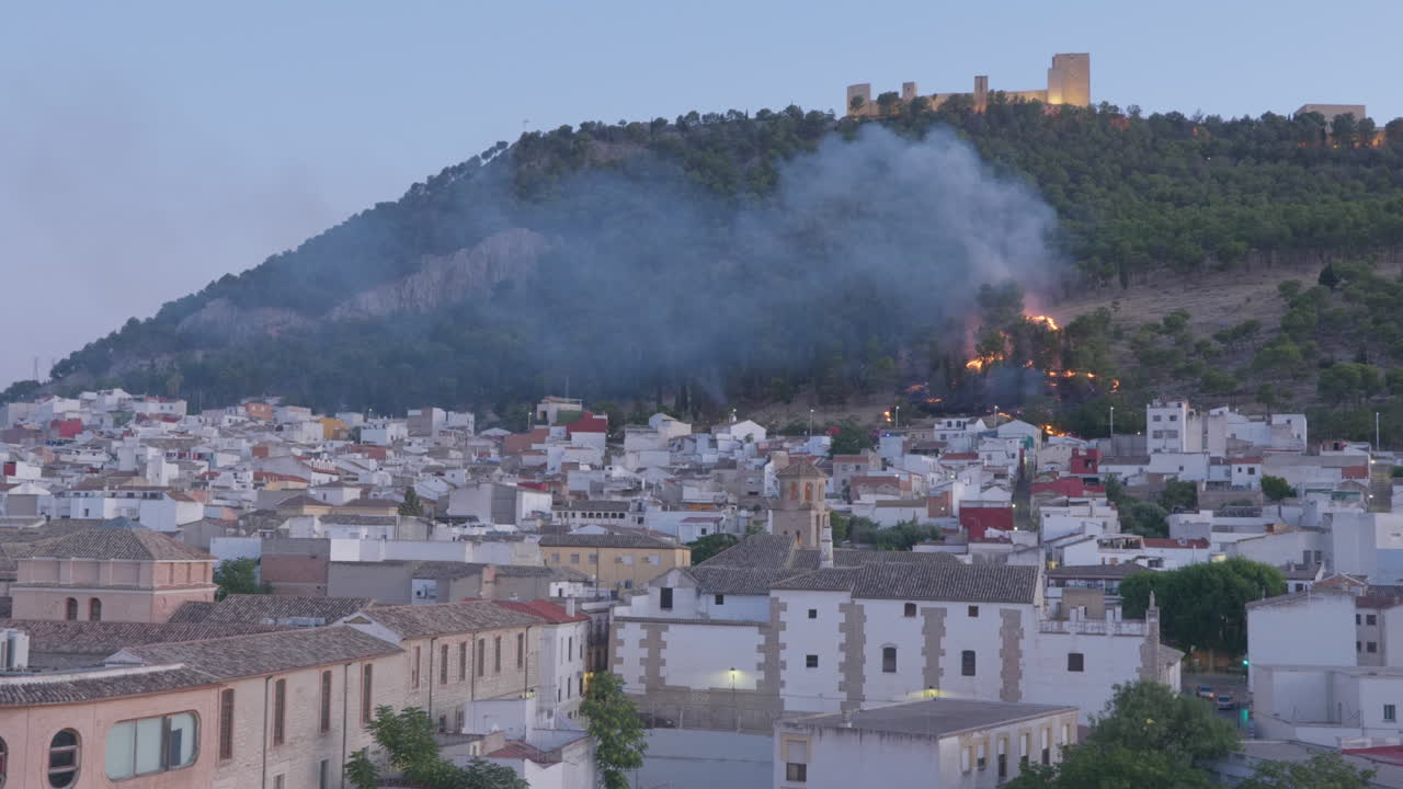 Forest fire on the slopes of Jaén Castle, Andalusia