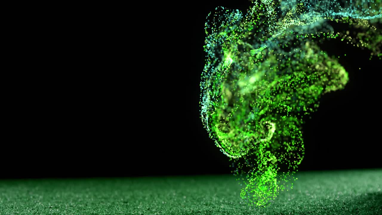 Animation of glowing green particles moving over rugby ball on pitch