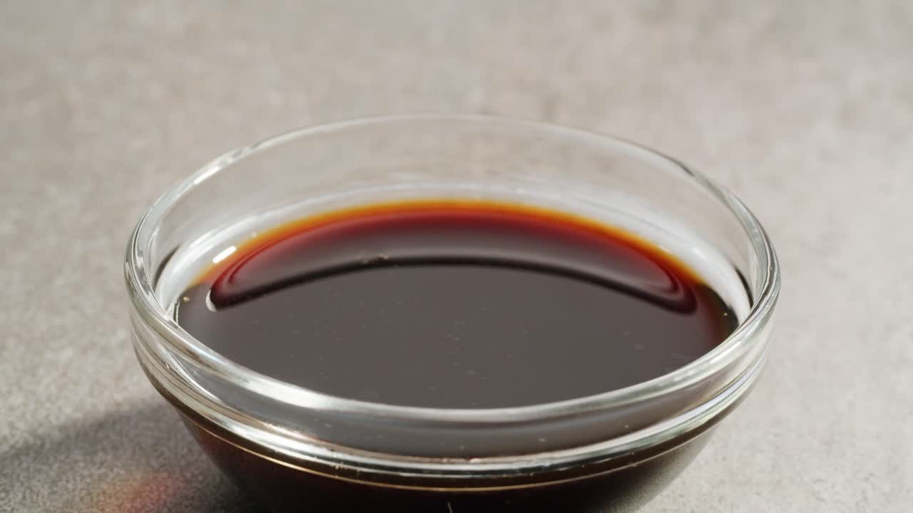 Dipping Crispy Chicken Wings or Pork in Sauce