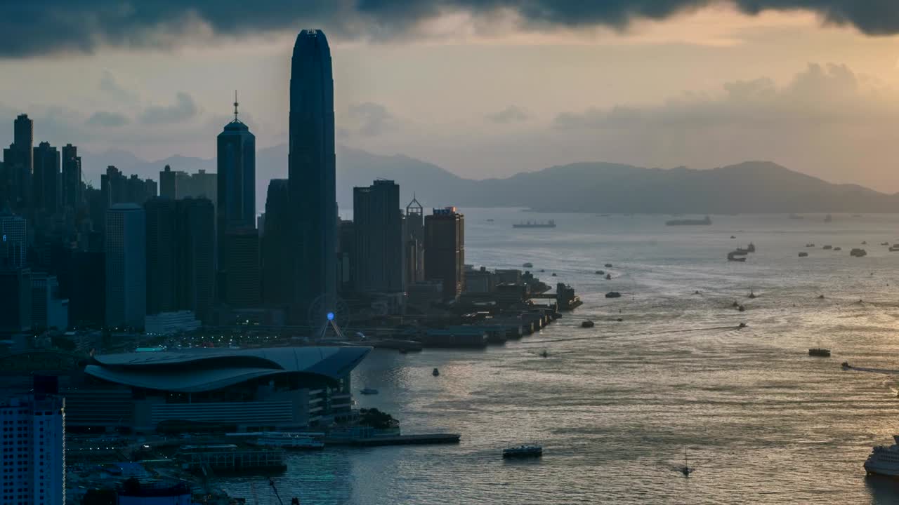 4k time-lapse: puesta de sol sobre el puerto de victoria en el pico de victoria, hong kong