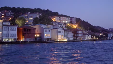 houses by the sea at night. sea and city view.