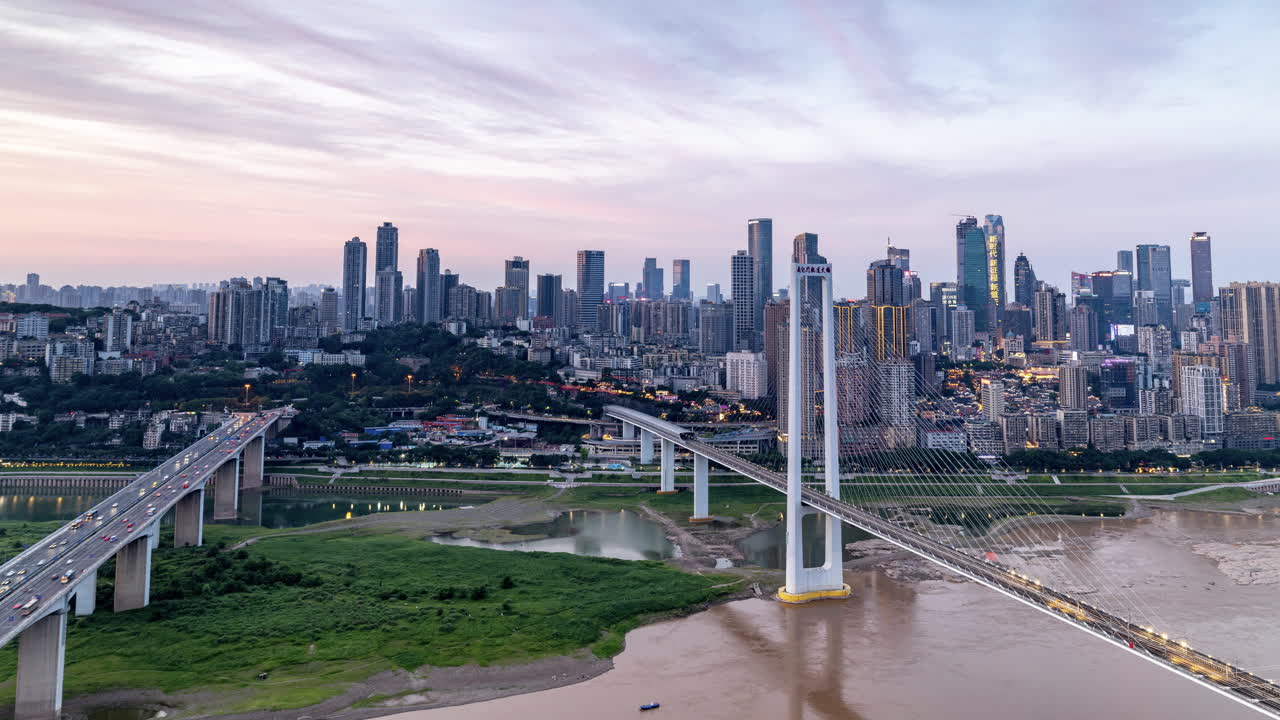 Timelapse of the amazing Chongqing cyberpunk city skyline from a high vantage point wirh the yangtze river