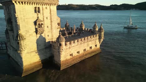 aerial view of the torre de belém at golden hour: a picturesque scene of history and beauty 05