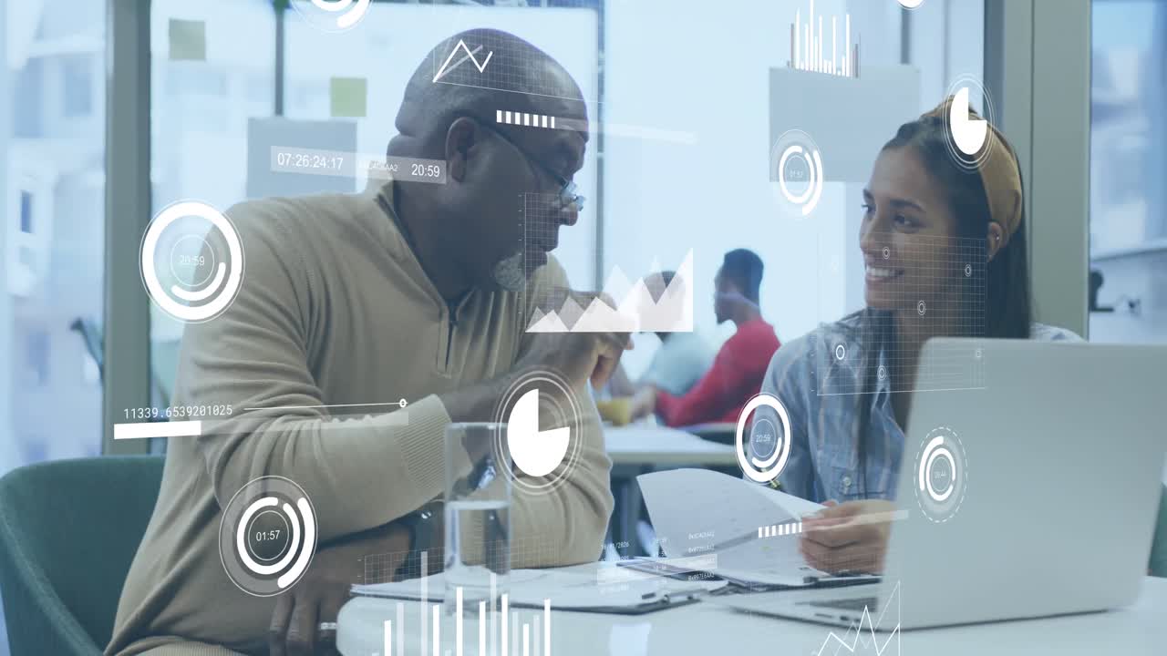 Animation of statistical data processing against diverse man and woman discussing at office