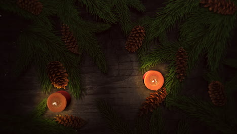 primer plano animado vela de navidad y ramas de árboles verdes 1