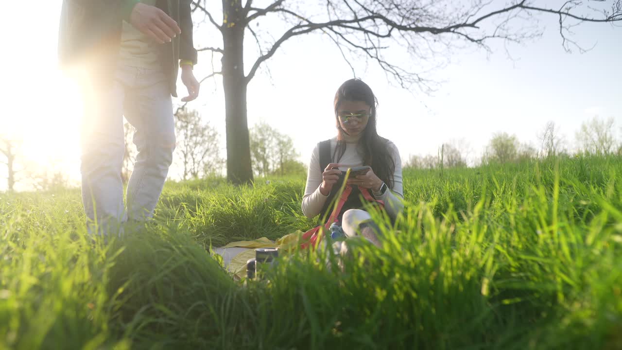 Couple Relaxing on a Picnic in a Park