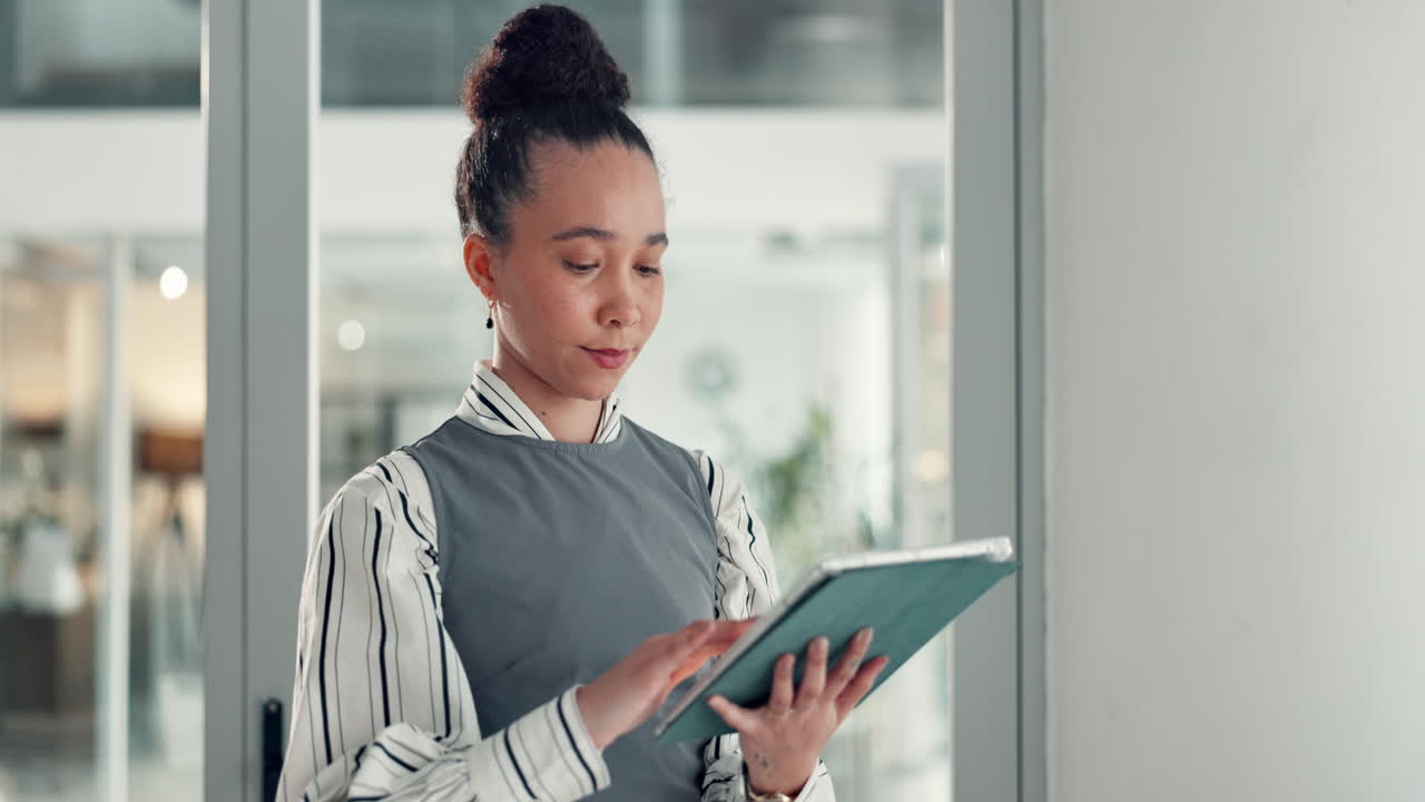 Businesswoman using a tablet in an office