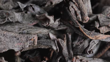 black large-leaf tea super macro close up.