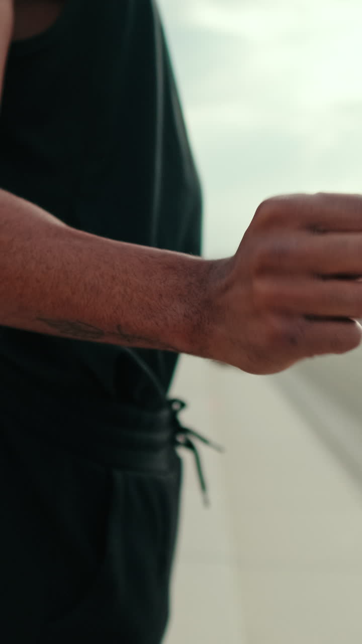 Man Stretching Arms Before Outdoor Workout