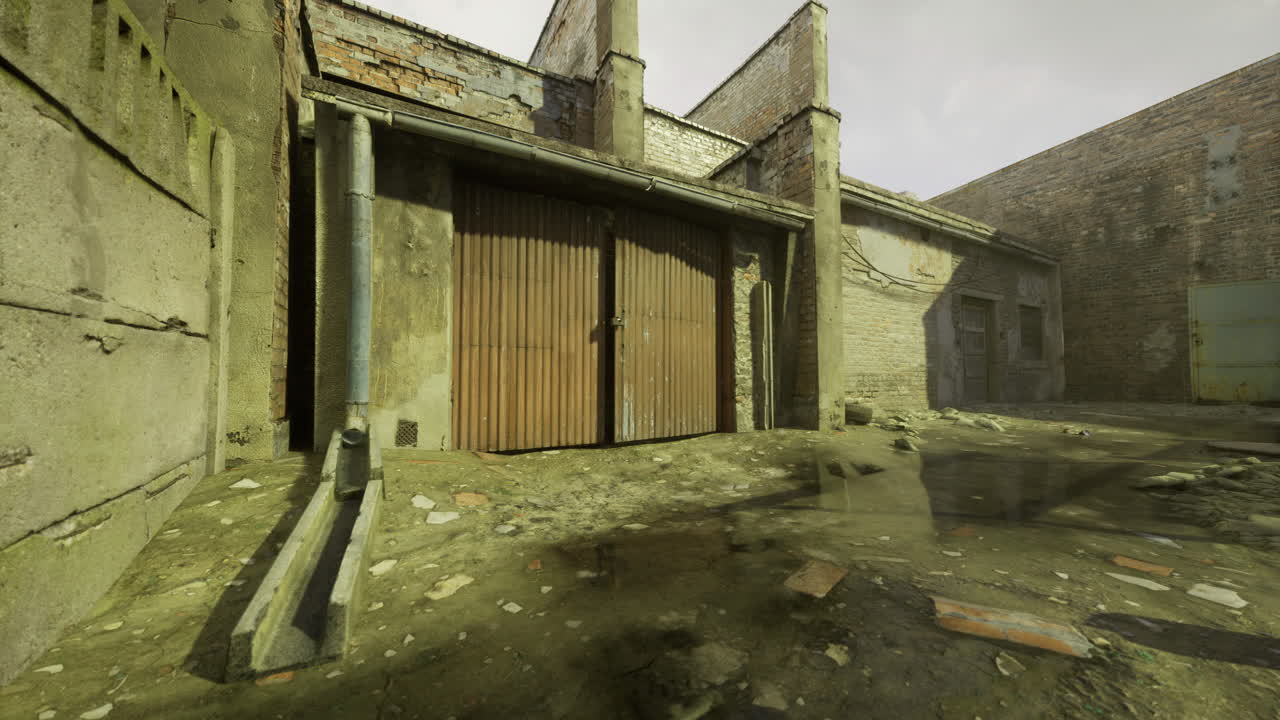 Exploring an abandoned industrial site with weathered buildings and debris