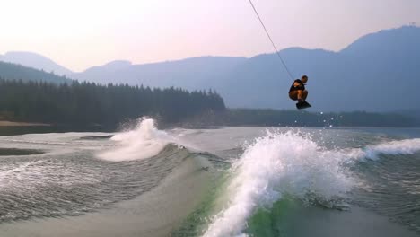 man wakeboarding in the river 4k