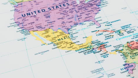 close-up of the country word mexico on a world map with the detailed name of the capital city