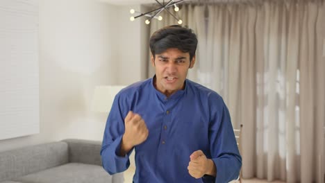happy and excited indian man
