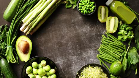 Green-healthy-food-composition-with-avocado--broccoli--apple--smoothie---