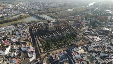 islamic mosque and catholic cathedral of cordoba in spain and bridge over guadalquivir river