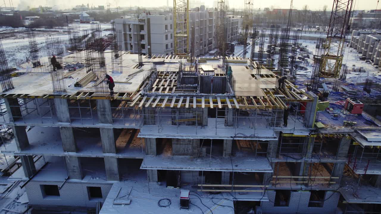 Construction Site of Apartment Building in Winter