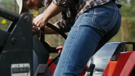 man driving a tractor