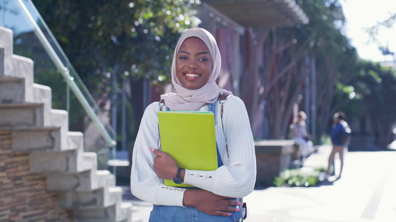 A smiling student on campus