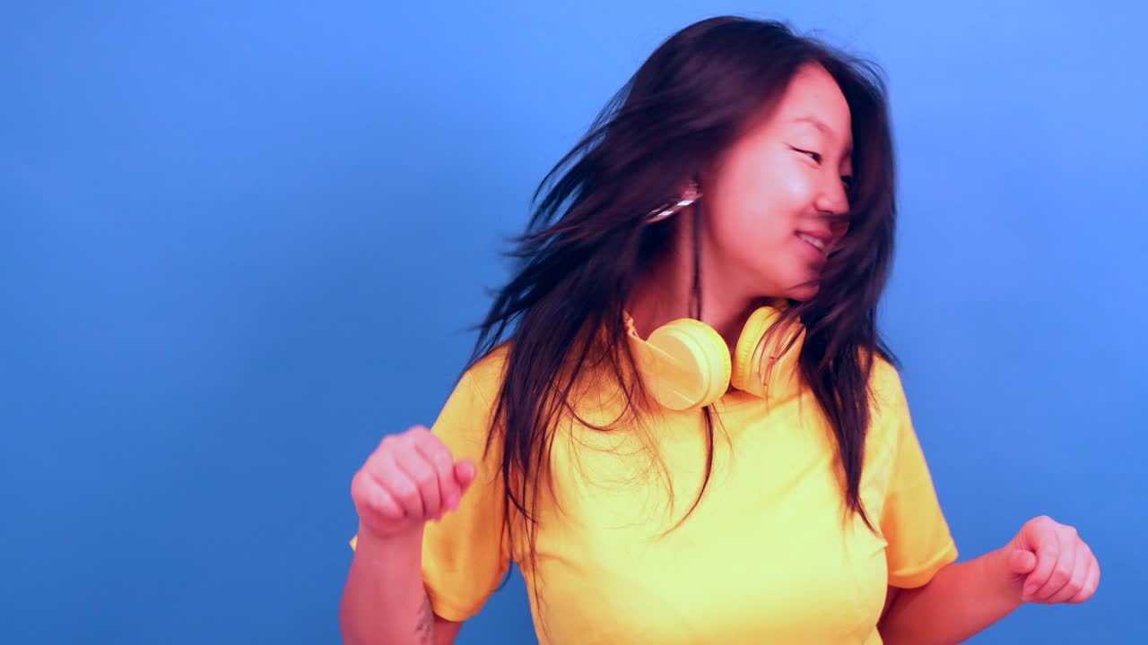 Woman Dancing with Headphones